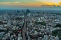 Aerial shot of Tokyo City at sunset with a busy street and beautiful sunbeams in the sky Royalty Free Stock Photo