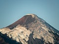 Aerial shot of the top of the Osorno volcano with its partially thawed glacier, Chile.