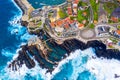 Aerial shot of town near the sea of Madeira island with a view of Atlantic ocean Royalty Free Stock Photo