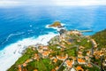 Aerial shot of town near the sea of Madeira island with a view of Atlantic ocean Royalty Free Stock Photo