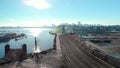 Aerial shot of a the trainyard and port facility with Downtown Vancouver in the background.