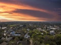 aerial shot of vast miles of homes nestled in between lush green trees with blue sky and clouds in Tybee Island Georgia Royalty Free Stock Photo