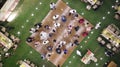 Aerial shot of wedding day, bride, groom. Dancing people outdoor. Romantic day top view. Royalty Free Stock Photo