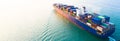 Aerial side view container ship carrying container in import export business logistic and transportation of international by