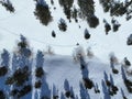 Aerial Ski touring man crossing over the camera view in the mountains in winter season fresh snow. Ski touring on skin Royalty Free Stock Photo