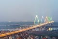 Aerial skyline view of Hanoi city, Vietnam. Hanoi cityscape by sunset period at Nhat Tan bridge