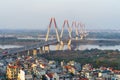 Aerial skyline view of Hanoi city, Vietnam. Hanoi cityscape by sunset period at Nhat Tan bridge