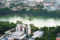 Aerial skyline view of Hoan Kiem lake or Ho Guom, Sword lake area at twilight. Hoan Kiem is center of Hanoi city. Hanoi cityscape. Royalty Free Stock Photo