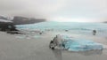 Aerial slow motion panning view Fjallsjokull glacier. The wonderful glacier lagoon of FjallsÃÂ¡rlÃÂ³n in Iceland