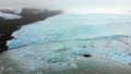 Aerial slow motion panning view Fjallsjokull glacier. The wonderful glacier lagoon of FjallsÃÂ¡rlÃÂ³n in Iceland