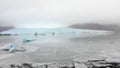 Aerial slow motion rising view Fjallsjokull glacier. The wonderful glacier lagoon of FjallsÃÂ¡rlÃÂ³n in Iceland