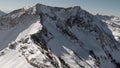 Aerial of Snow on Mountain Ridge Line