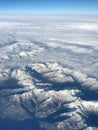 Aerial snowy alps snow winter mountains Royalty Free Stock Photo