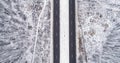 Aerial snowy road winter landscape asphalted track
