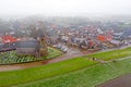 Aerial from the snowy village Wierum in the Netherlands near the Waddenzee