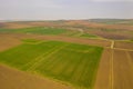 Aerial spring landscape fields and village