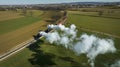 Aerial of a Steam Double-Header Freight , Passenger Combo Train Approaching Blowing Lots of Smoke