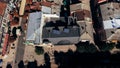 Aerial street view of a small town and houses with new bright tiled roofs