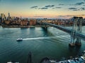 Aerial stunning view of the iconic Brooklyn Bridge at sunset in New York