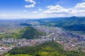 Aerial summer city on mountain valley