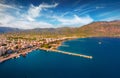 Aerial summer cityscape of Kalamata port. Attractive morning seascape of Myrtoan Sea.