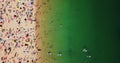 Aerial Summer View Of People Crowd Having Fun On Beach