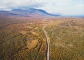 Aerial sunny fall autumn view of Abisko National Park, Kiruna Municipality, Lapland, Norrbotten County, Sweden, shot from drone, Royalty Free Stock Photo