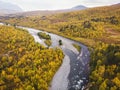 Aerial sunny fall autumn view of Abisko National Park, Kiruna Municipality, Lapland, Norrbotten County, Sweden, shot from drone, Royalty Free Stock Photo