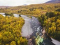 Aerial sunny fall autumn view of Abisko National Park, Kiruna Municipality, Lapland, Norrbotten County, Sweden, shot from drone, Royalty Free Stock Photo