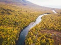 Aerial sunny fall autumn view of Abisko National Park, Kiruna Municipality, Lapland, Norrbotten County, Sweden, shot from drone, Royalty Free Stock Photo