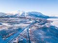 Aerial sunny winter view of Abisko National Park, Kiruna Municipality, Lapland, Norrbotten County, Sweden, shot from drone, with r Royalty Free Stock Photo