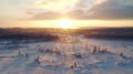 Aerial Sunrise Over Snowy Winter Landscape: Uhd Image With Soft-focus Technique