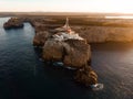 Aerial sunrise panorama of Cabo de Sao Vicente Cape St Vincent mediterranean Algarve cliff atlantic coast beach Sagres