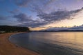 Aerial sunrise seascape with clouds and partial moon