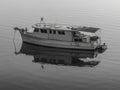 Aerial sunrise waterscape with boat and reflection Royalty Free Stock Photo