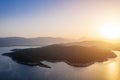 Aerial sunset sea islands. Stuning view to Greek islands next to Poros.