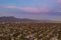 Aerial sunset view of the  Arcadia area with the white snowy Mt. Baldy Royalty Free Stock Photo