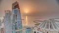 Aerial sunset view of JBR and Dubai Marina skyscrapers and luxury buildings timelapse from above Royalty Free Stock Photo