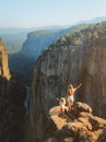 Aerial Tazi canyon view mother and child on cliff family travel hiking outdoor exploring Turkiye