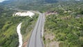 Aerial of the toll road in Jamaica with Vehicular cars driving