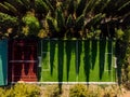 Aerial top above drone view of sport playground in green city park or forest tree shadows on morning sunrise or sunset Royalty Free Stock Photo