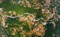 Aerial top down daytime view of Sorrento coast, Italy. Streets of city with hotels and restaurants are located on rocky seashore. Royalty Free Stock Photo