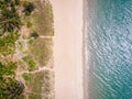 Aerial top down drone shot of empty Sanya bay beach with white sand and water Hainan tropical island China Royalty Free Stock Photo