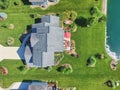Aerial Top Down of Modern Waterfront Luxury Home with Lush Garden Royalty Free Stock Photo