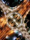 Aerial top down night view of a multilevel junction highway