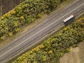 Aerial top down shot of highway with truck trailer and the car. Russia. Royalty Free Stock Photo