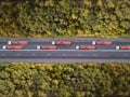 Aerial top down shot of highway with truck trailer and the car. Rostov region. Russia. Royalty Free Stock Photo