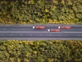 Aerial top down shot of highway with truck trailer and the car. Rostov region. Russia. Royalty Free Stock Photo