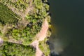 Aerial top down view of beautiful green waters of lake. summer scenic landscape Royalty Free Stock Photo