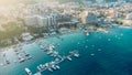 Aerial top down view of boat dock and yacht port in Budva, Montenegro. White private motor boats are moored to pier on Adriatic se Royalty Free Stock Photo